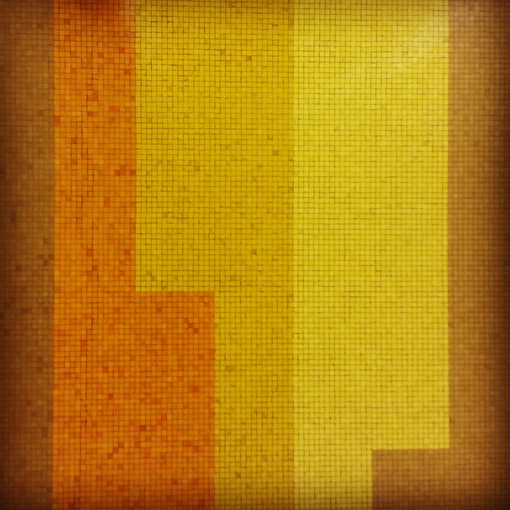 Orange, yellow, and brown mosaic tiles.